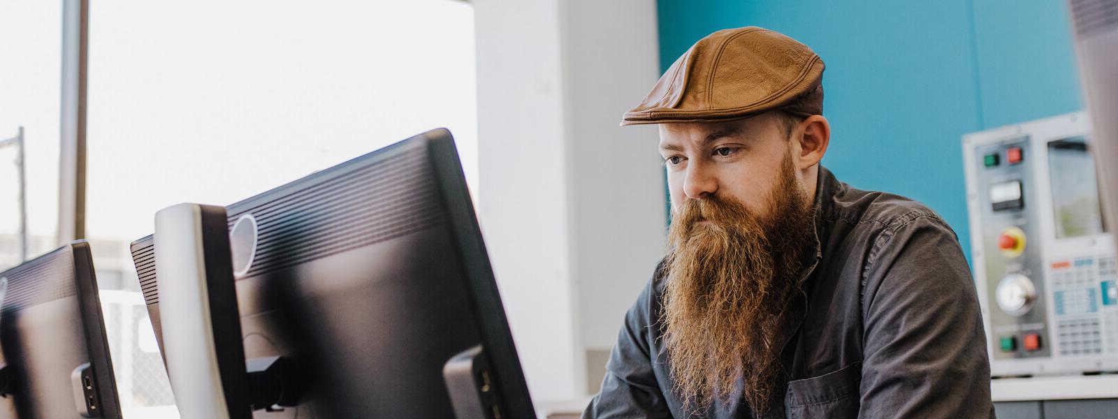 Male student working in computer lab